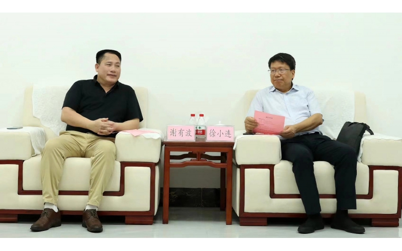 徐小连与谢有波就加快推进江州区旱改水项目进行座谈